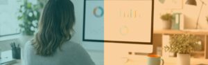 Person at a desk reviewing a business dashboard with charts, with QLine IT teal and orange brand colours