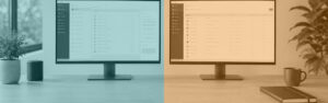 Desk with two monitors showing business software, in QLine IT teal and orange brand colours